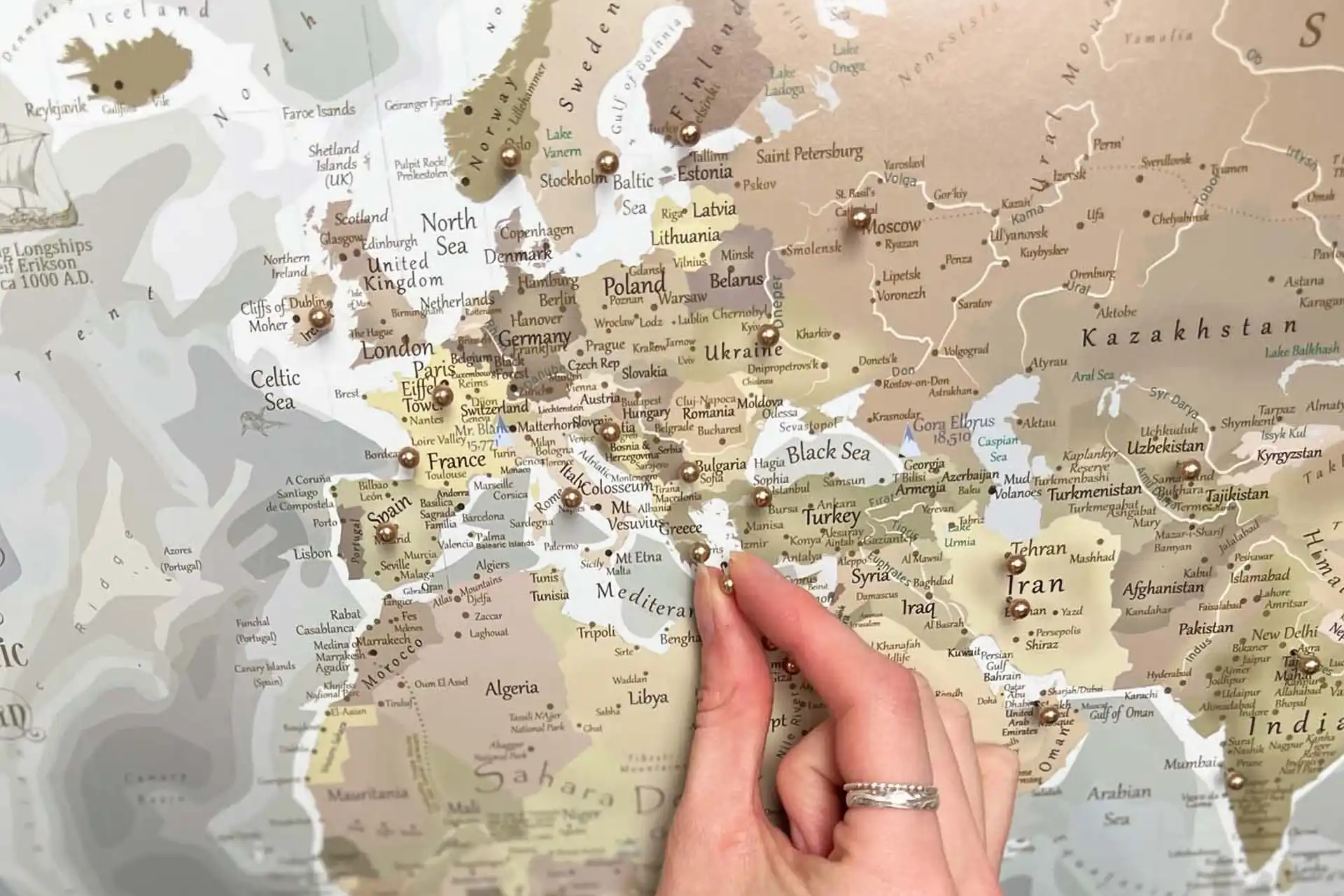 World Map with gold pins