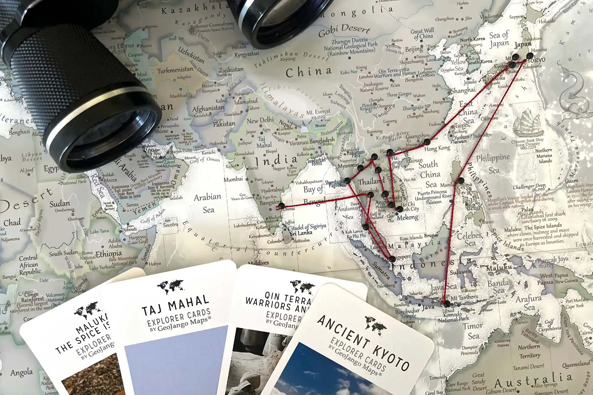 String and pins used to journal your adventures on a travel map