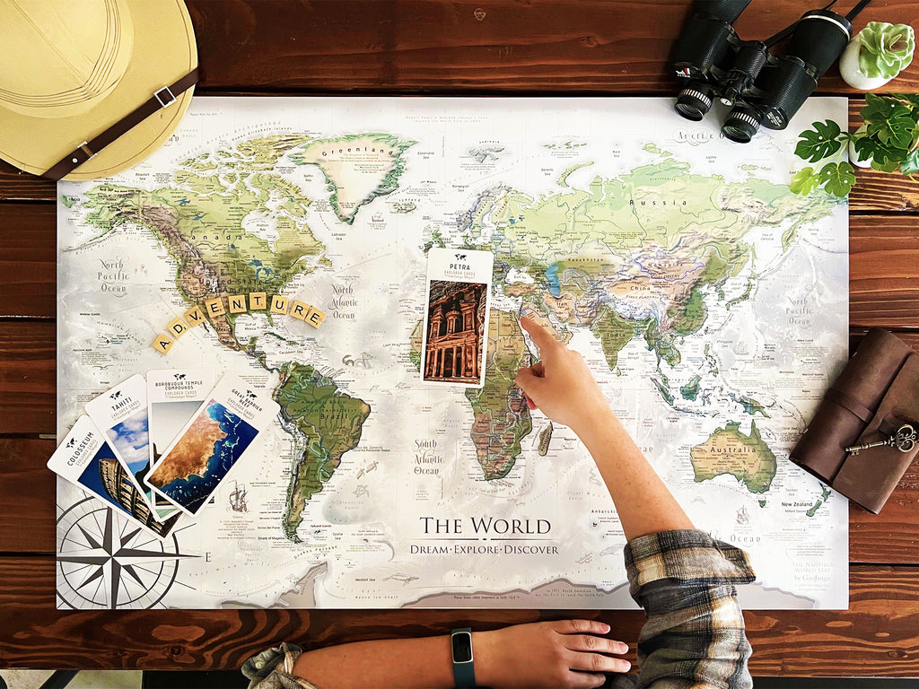Bright white and green push pin travel map of the world with detailed labels of countries, cities, and historical facts