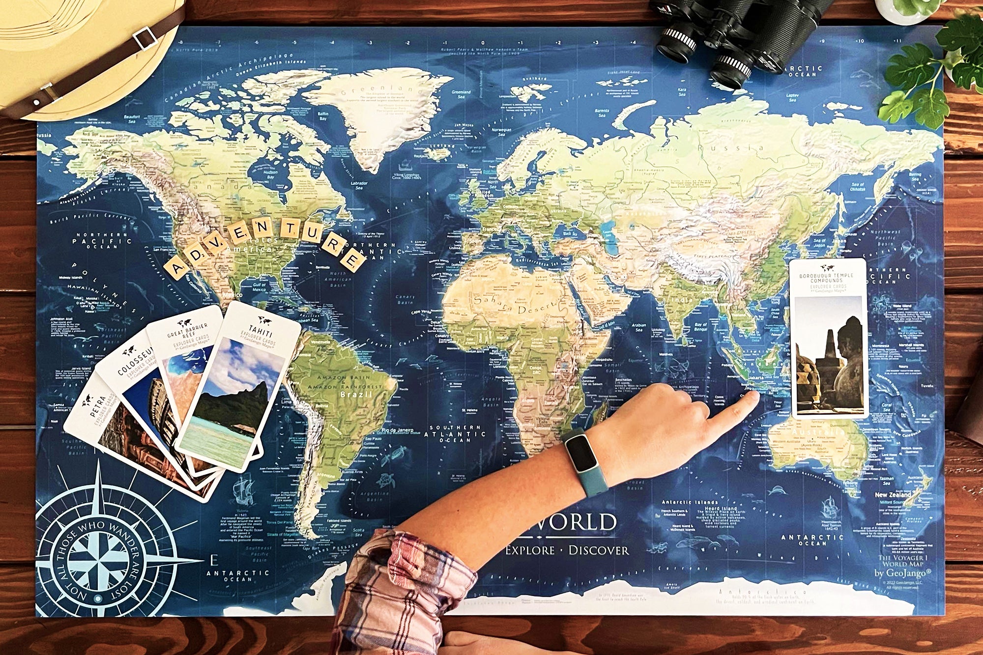 World Push Pin Travel Map in blue on wood