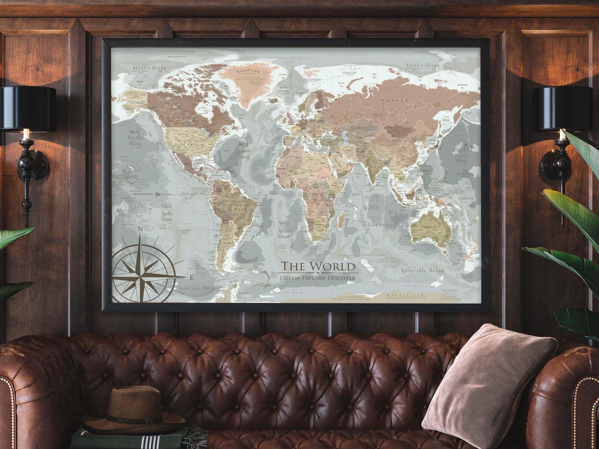 Push Pin Travel Map above a leather couch