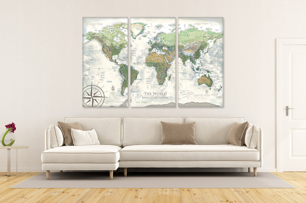 3 panel canvas world map gallery above a sofa