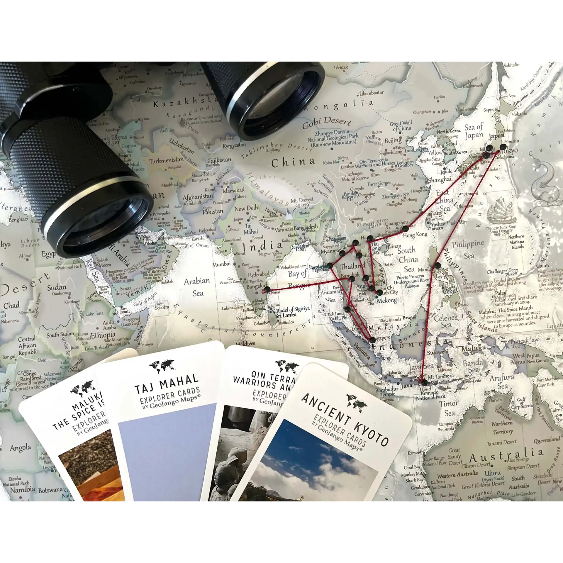 String and pins used to journal your adventures on a travel map