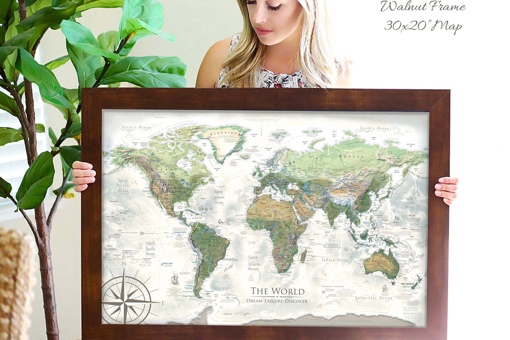 Walnut framed map of the world in canvas