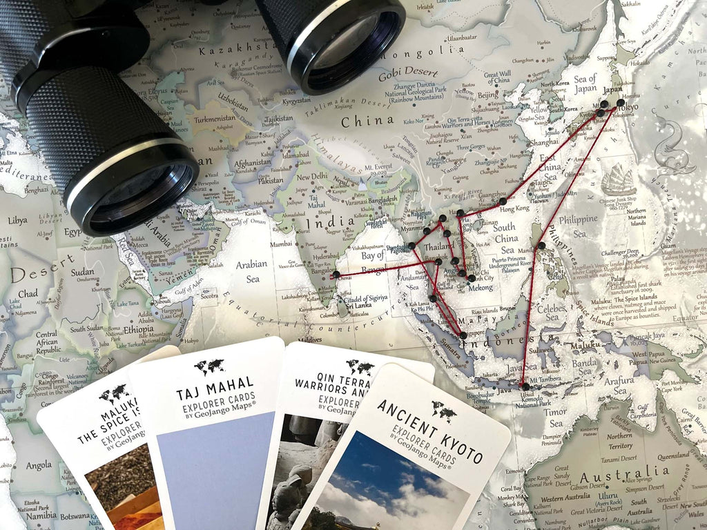String and pins used to journal your adventures on a travel map